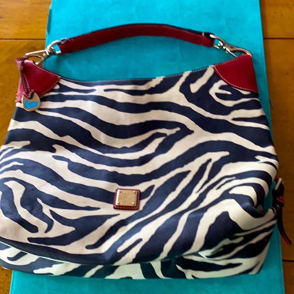 Beautiful Dooney  & Bourke Handbag, 12 L -16 W - 5 1/2 inches